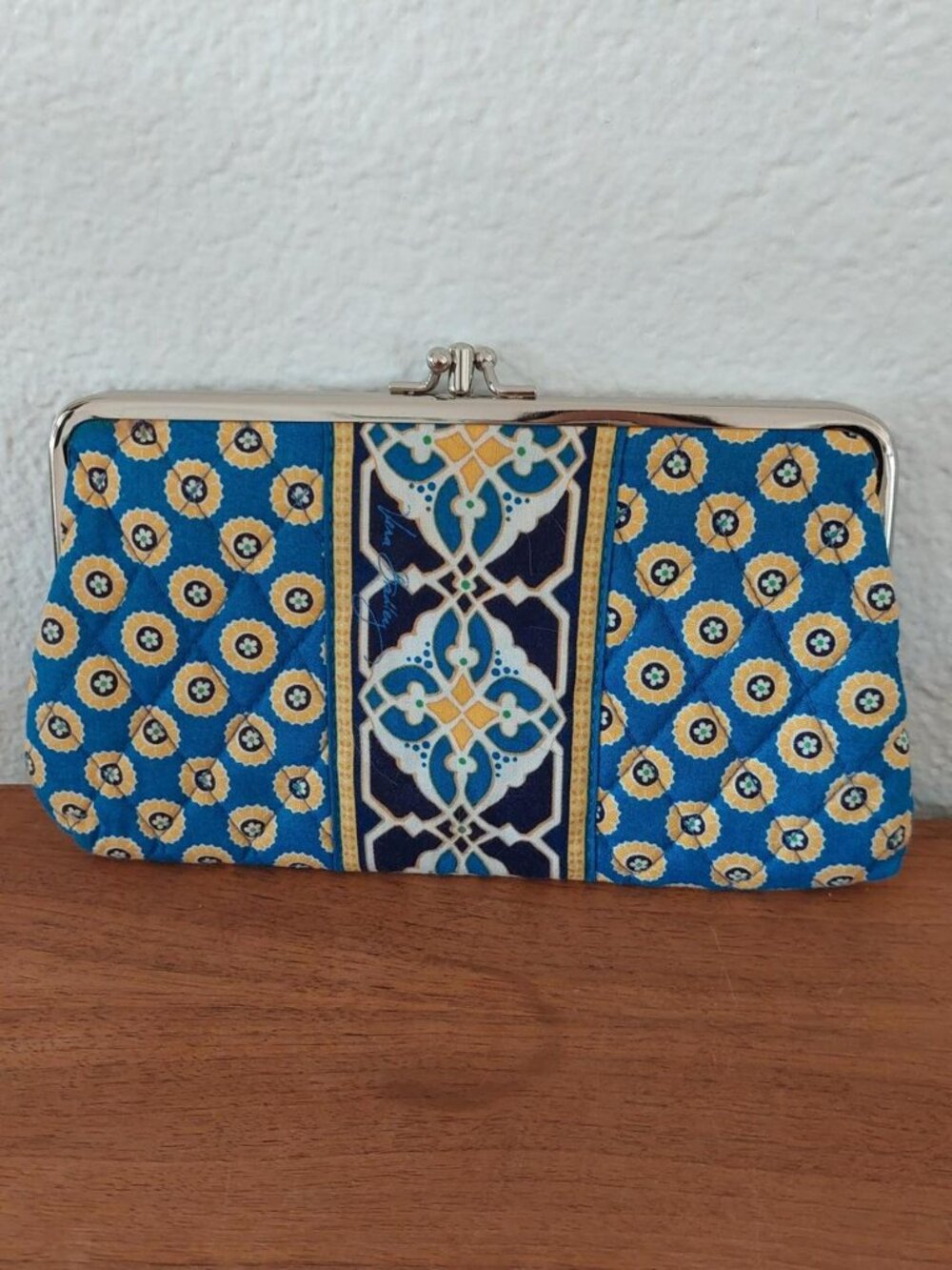 vera bradley rivera blue and yellow geometric patterned clutch purse with a boho